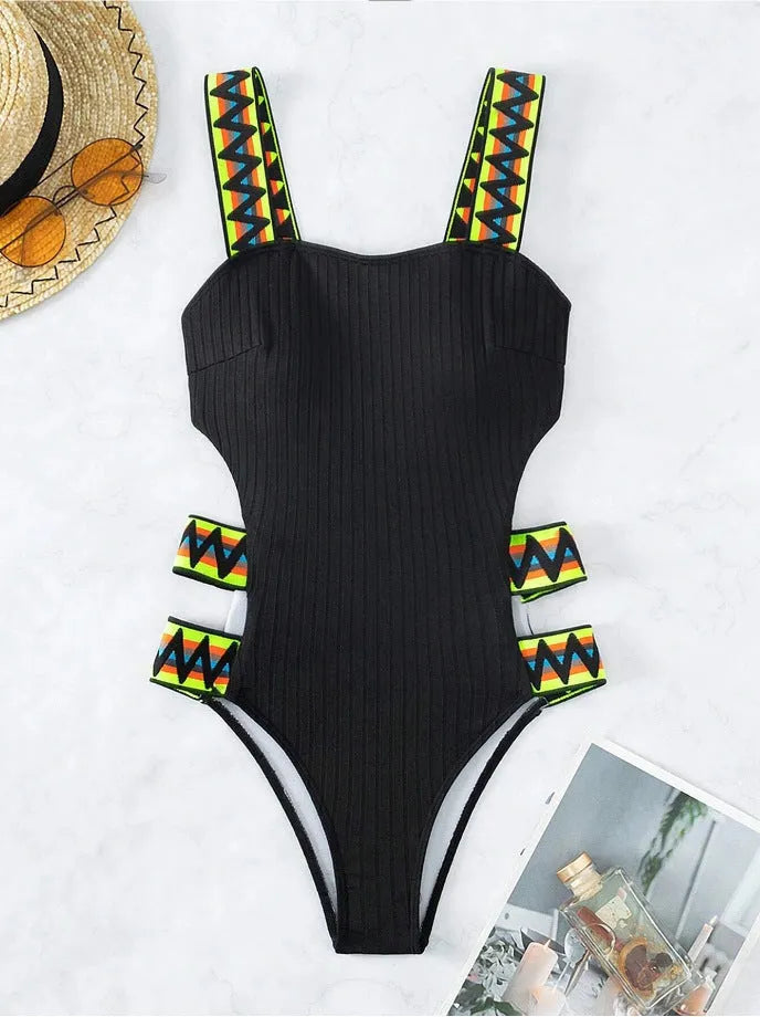 Women's black and orange solid colour one-piece swimsuit in polyester fabric