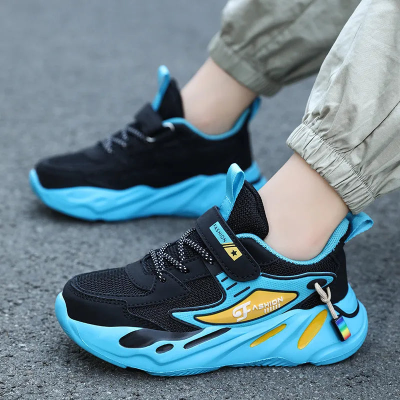 Boys' dark blue and black sports running shoes with velcro strap and mesh upper.