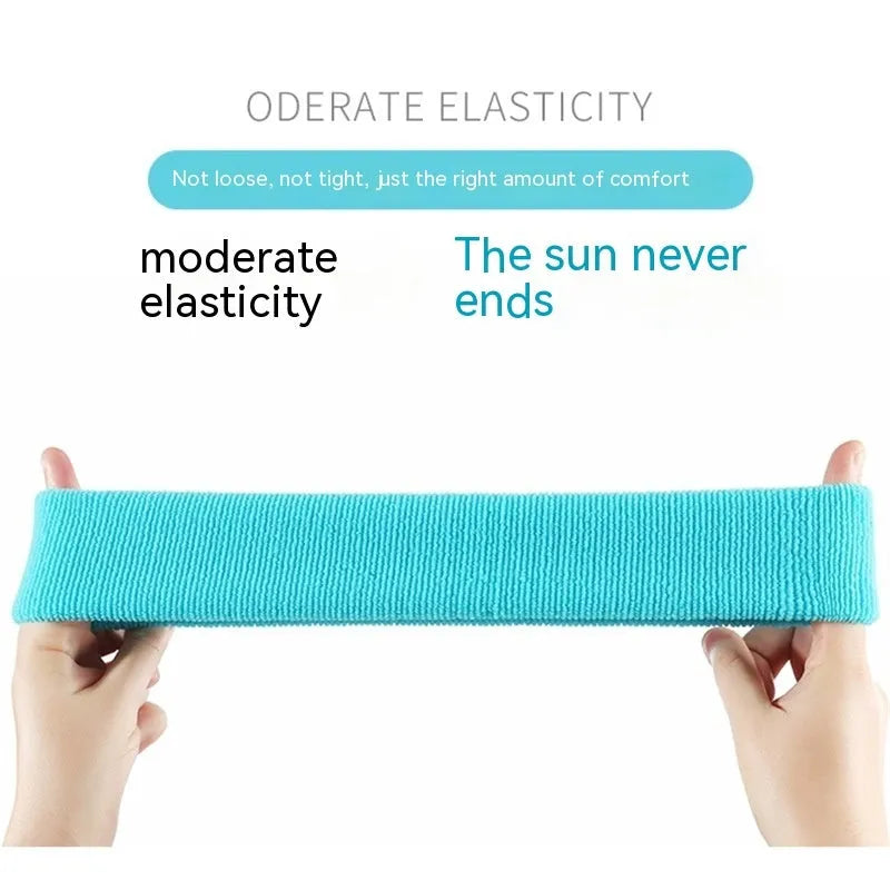 Widening elastic sports sweat headband in solid colour made from polyester spandex.