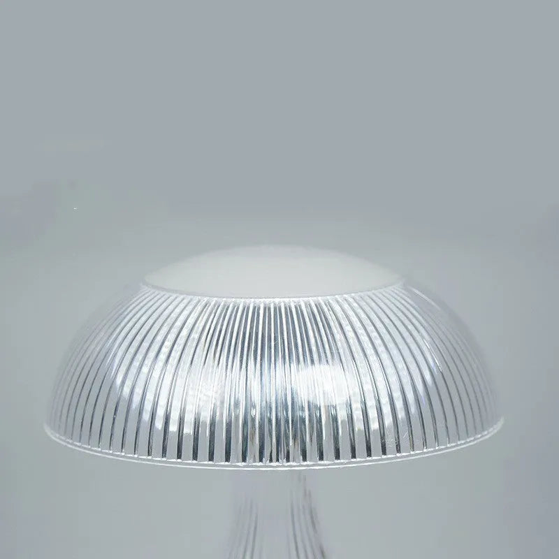 White acrylic USB rechargeable touch control table lamp with three colour settings.