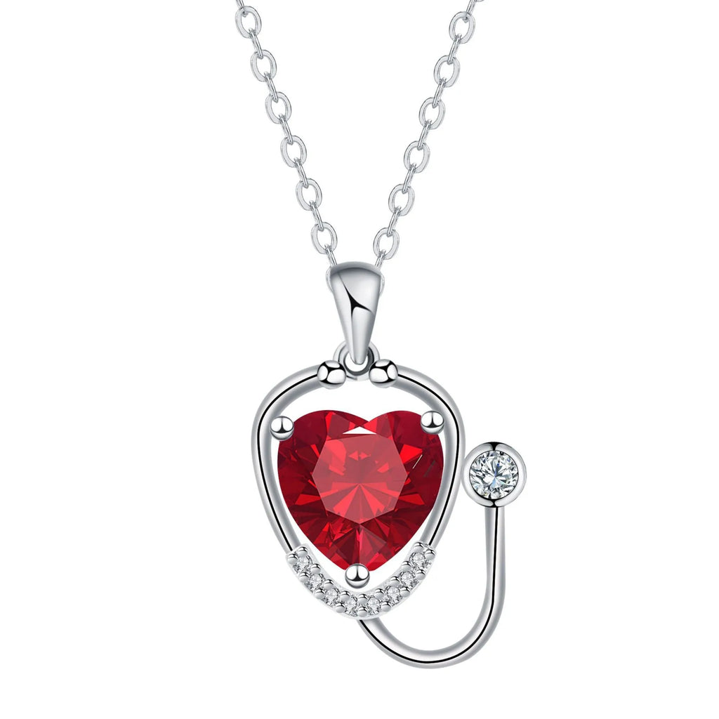 Women's red diamond stethoscope necklace with wings and cross motifs on copper chain