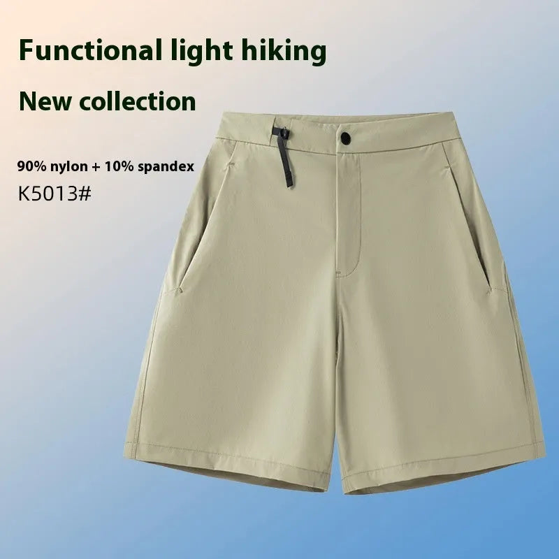 Men's solid colour quick-dry sports shorts with elastic construction for running and climbing.