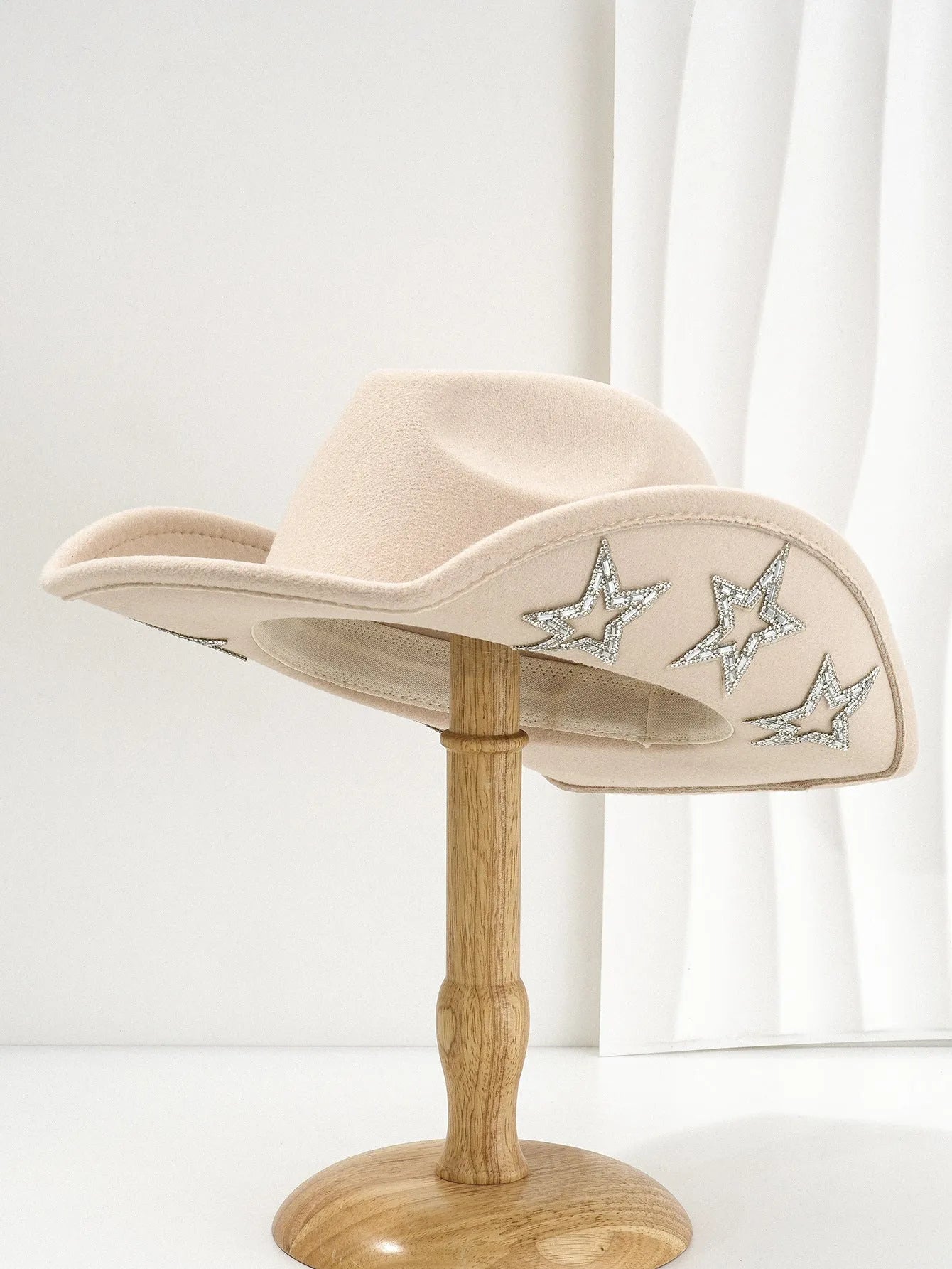 Polyester western top hat with hexagonal star design on conical crown in size M