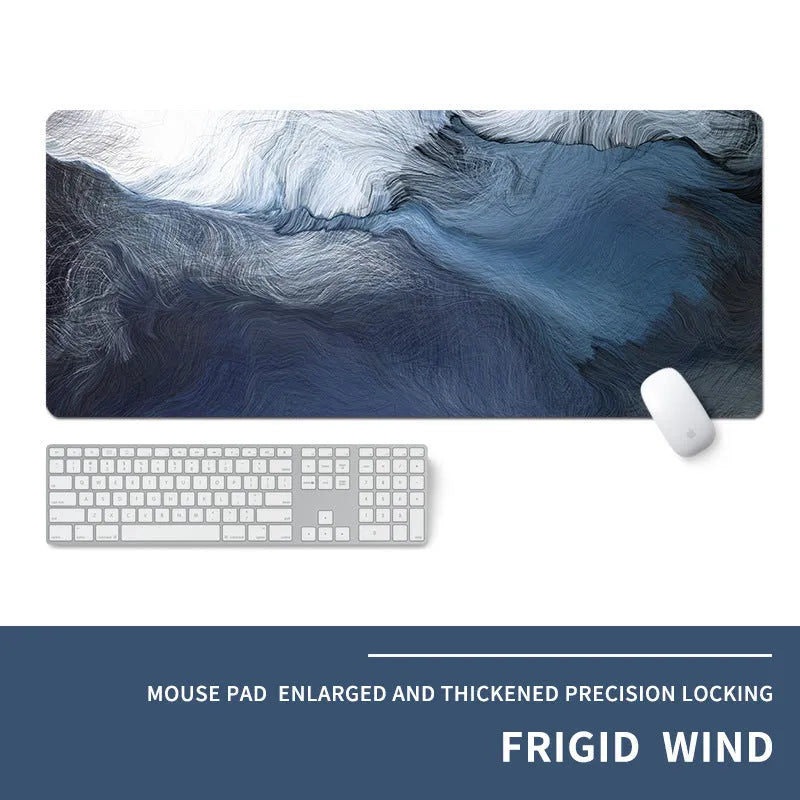Oversized natural rubber gaming desk mat with graphical print, showing keyboard and mouse placement.