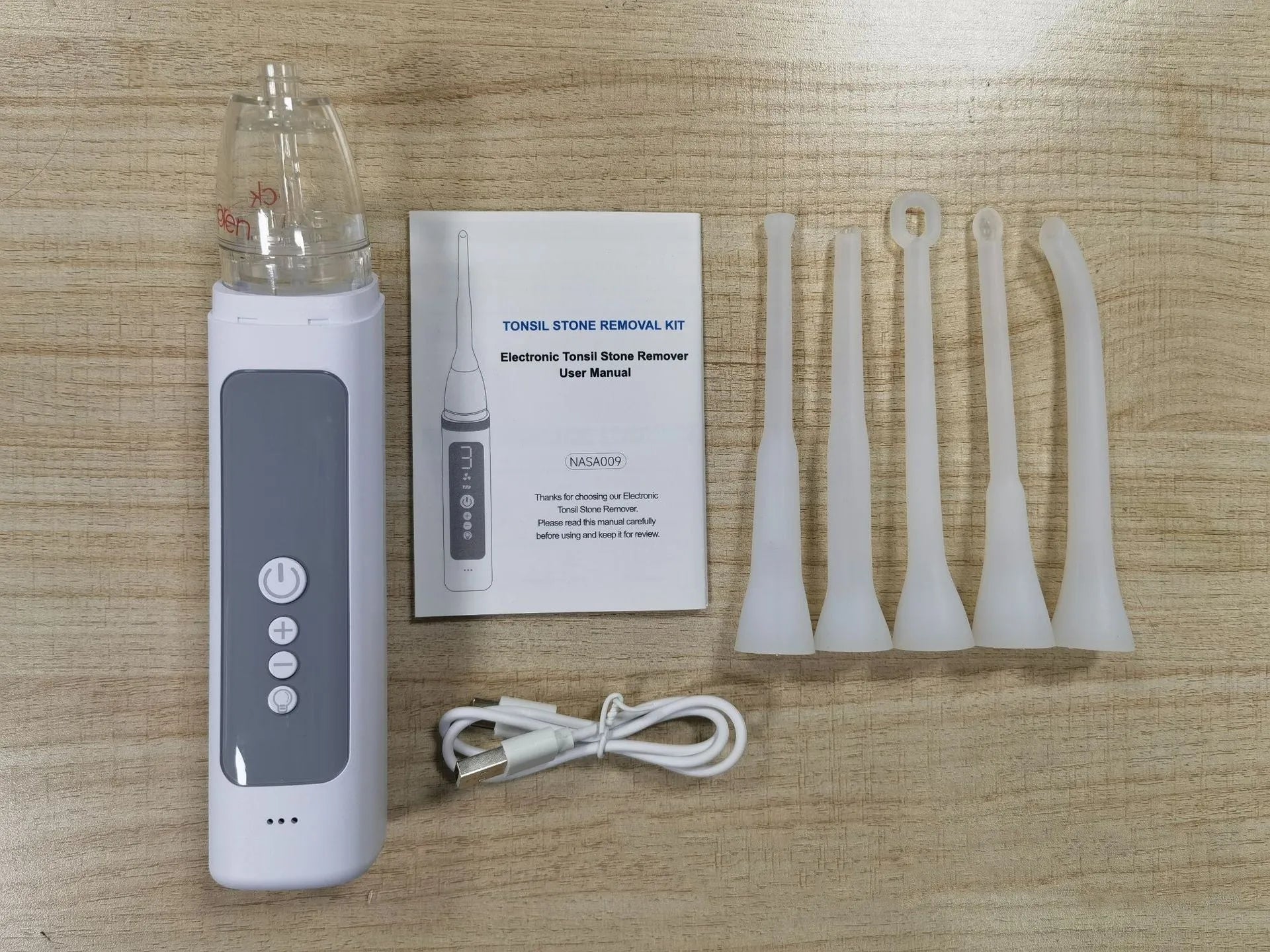 Milky white tonsil stone removal tool with oral cleaning extractor for dental calculus
