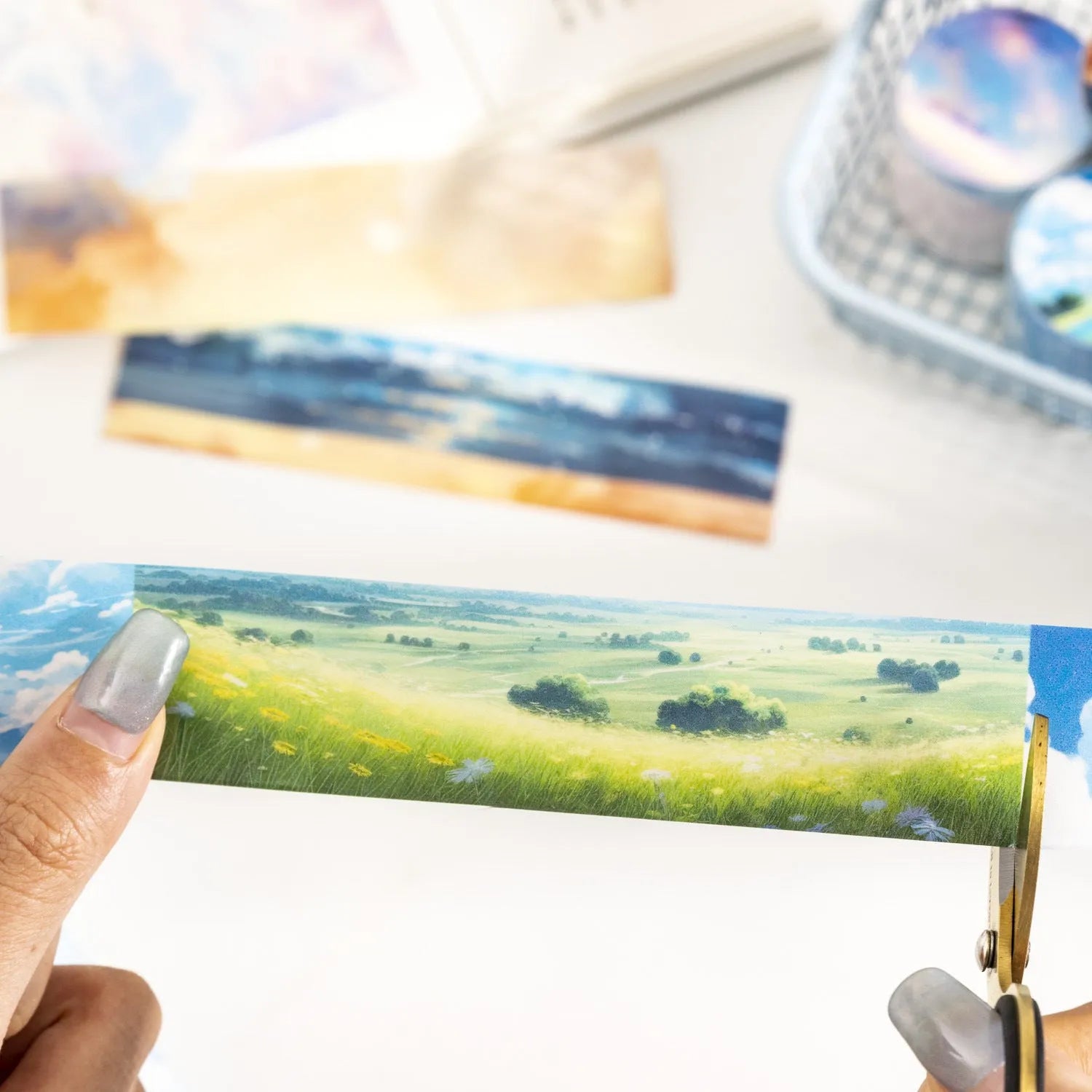 Japanese paper washi tape roll with sky theme designs including clouds, sun and nebula patterns