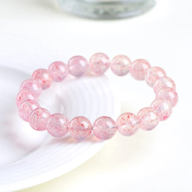 Natural white water strawberry quartz crystal bracelet with geometric cut beads