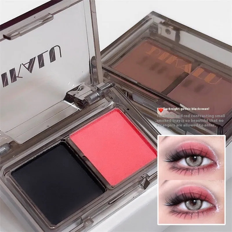 Cool two-tone eyeshadow palette showing pink and black matte and shimmer pressed powder in a single compact.