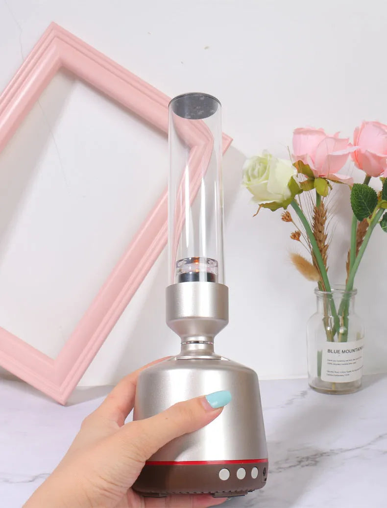 White silver candlelight Bluetooth speaker with night light in cylindrical design