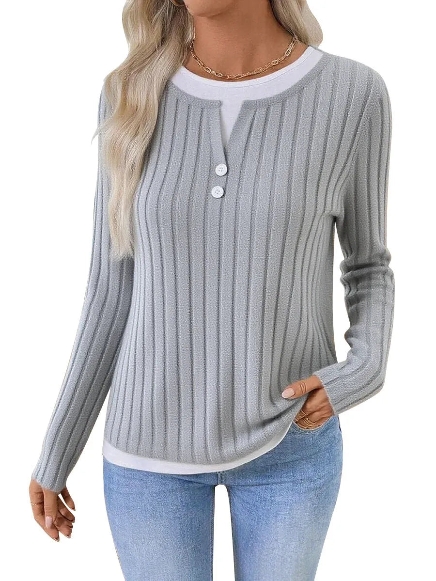 Women's grey fake two-piece striped pullover sweater with round neck and button detail.