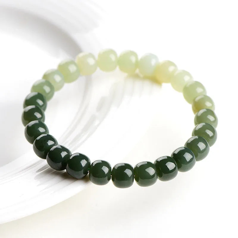Hetian Jade Water Gradient Bracelet with polished oval beads in clear water colour.