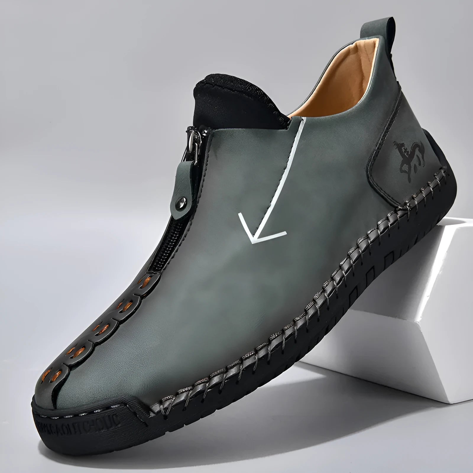 Men's black leather zip-up boots with hand-stitched detailing and round toe