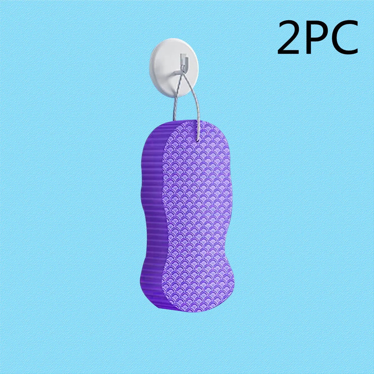 White 3D fish scale pattern bath sponge ball on a bathroom surface