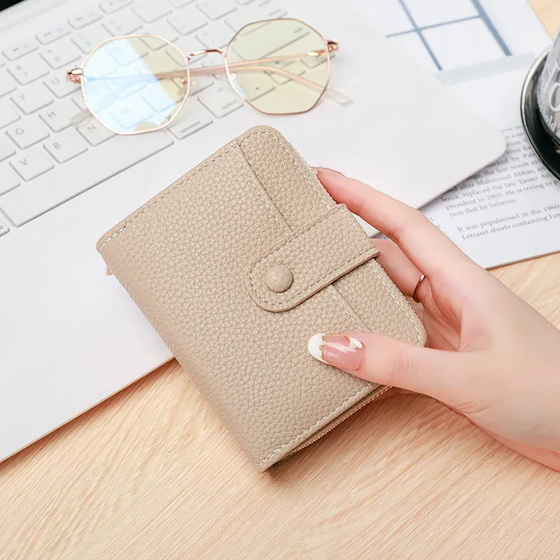 Ladies' short wallet with lychee pattern texture showing 2-fold design in beige, pink, black, and red colour options