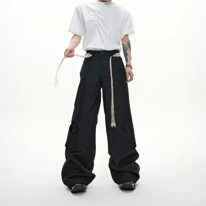 Men's straight leg jeans with 3D texture, belt stitching, and decorative zipper details in dark colour