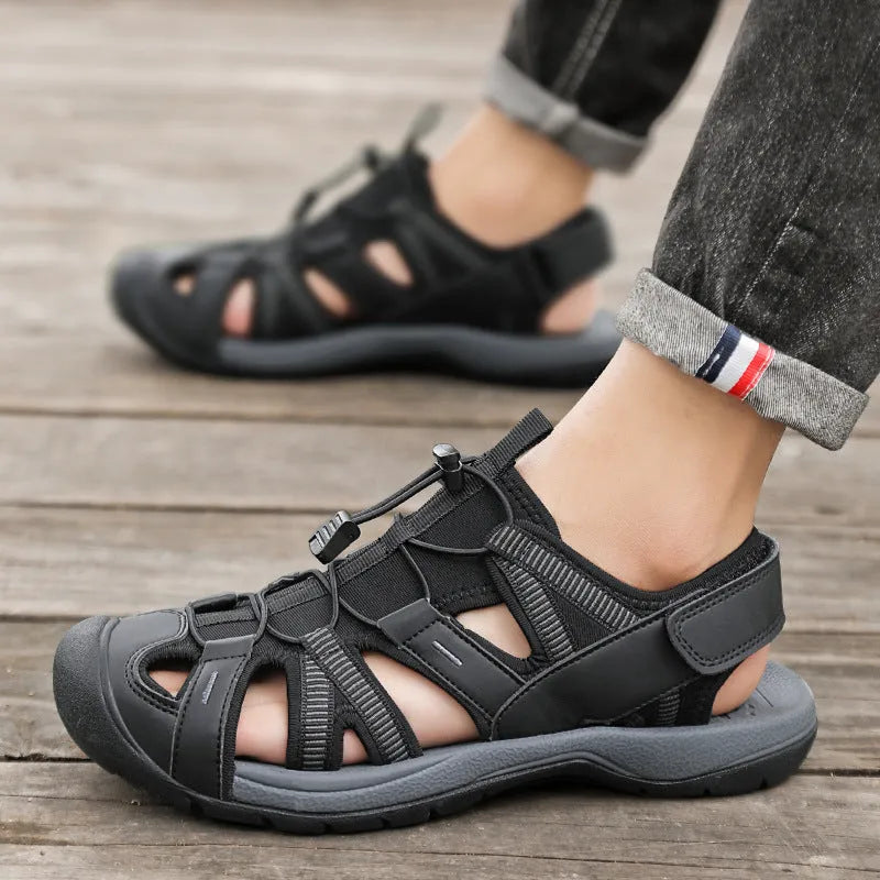 Men's blue and black mesh sports shoes with Velcro strap and rubber sole.