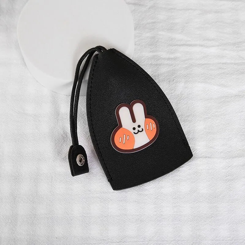 Cartoon design pull-out car key case made from soft PU leather, showing approximate size.