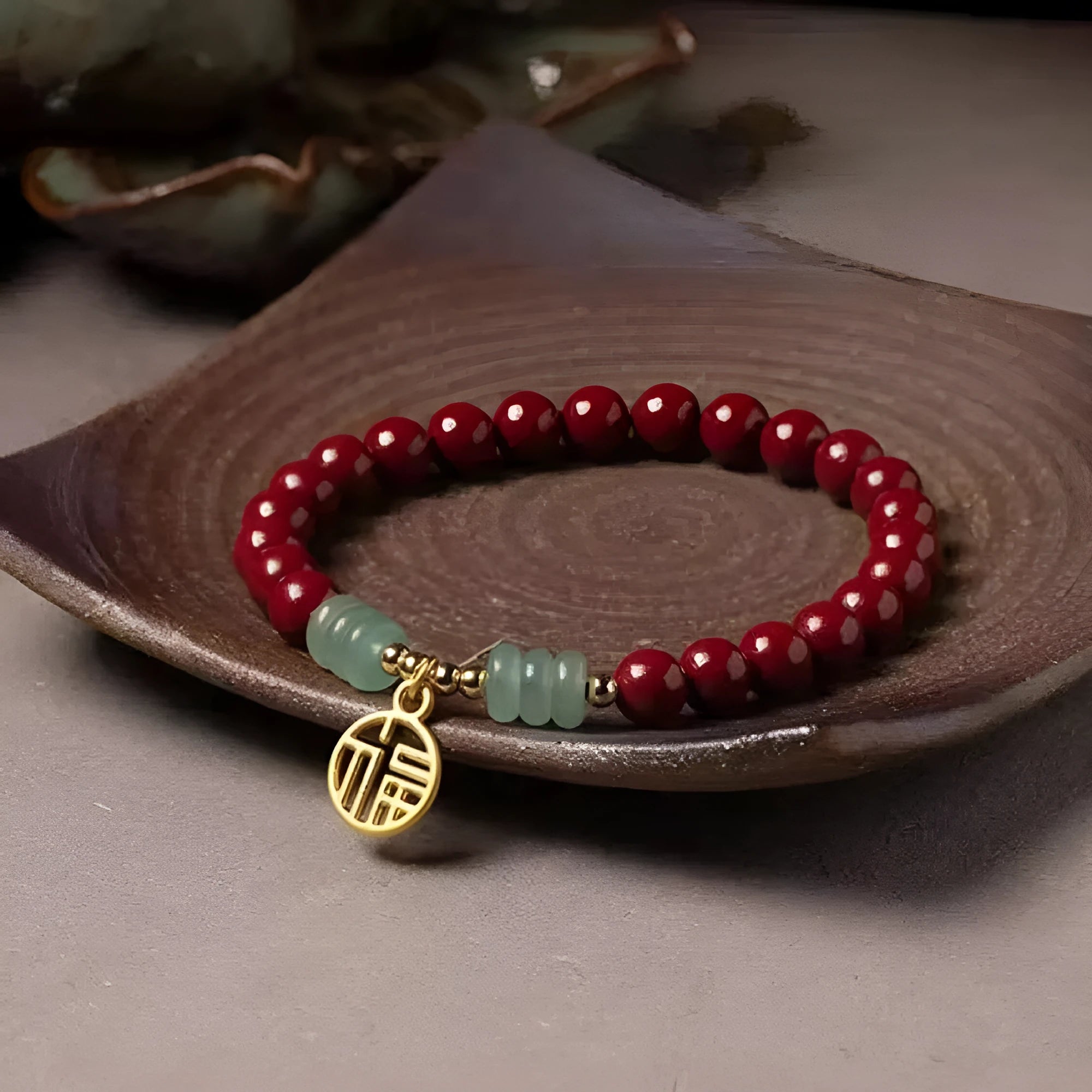 Gold cinnabar bracelet with wave design and copper beads in traditional Chinese style