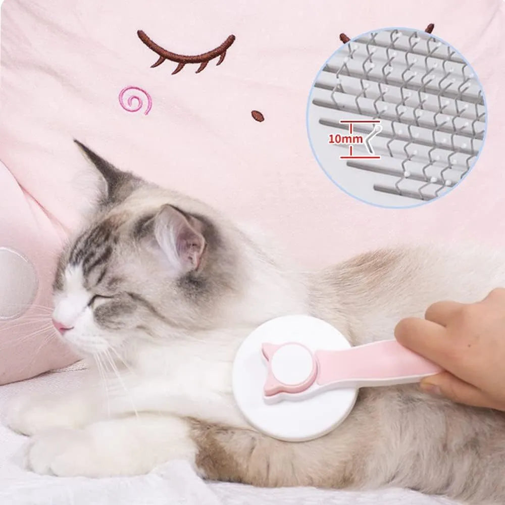 Blue self-cleaning cat brush with rubber handle and metal pins for pet grooming.