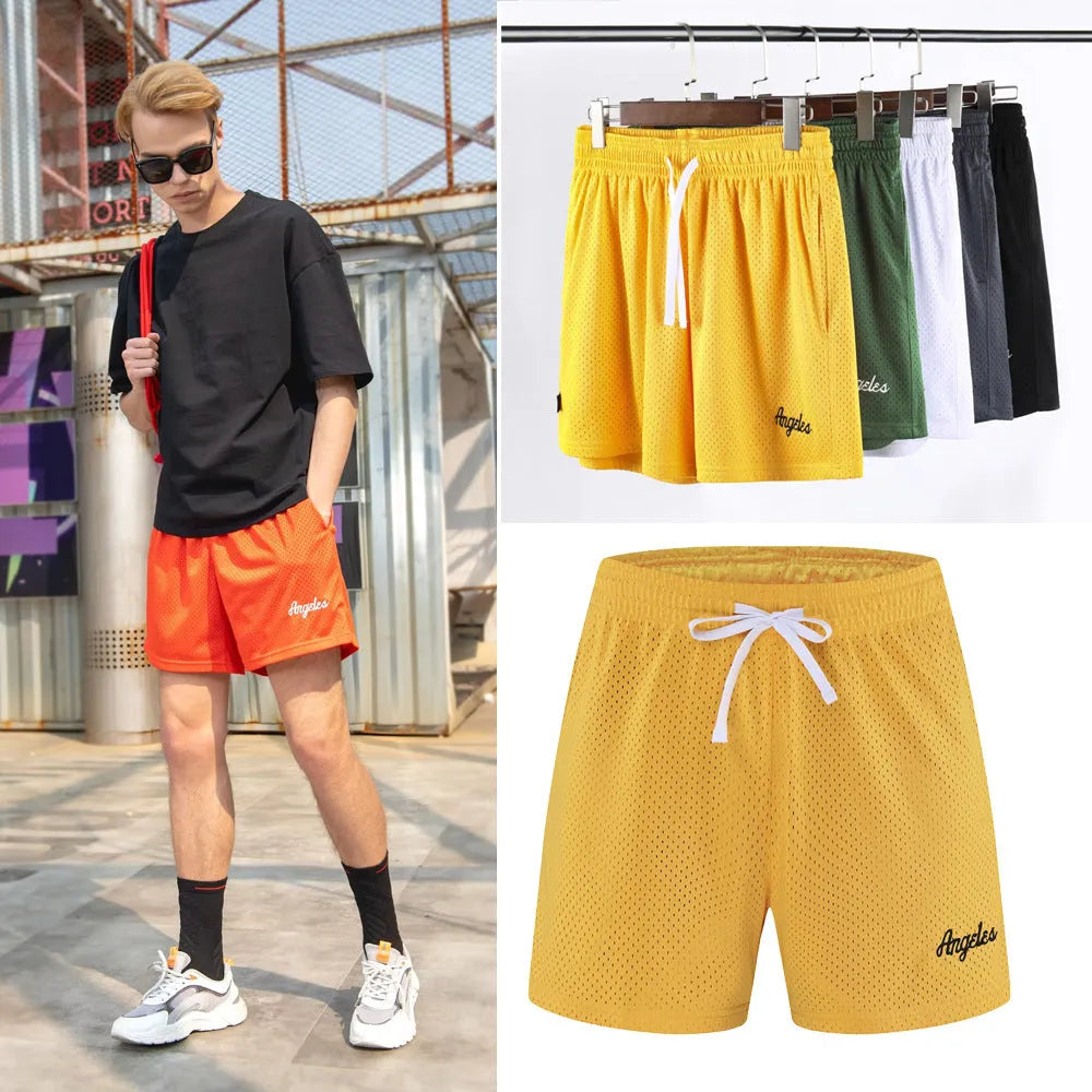 Men's black double-layer mesh shorts laid flat, showing sports and leisure style.
