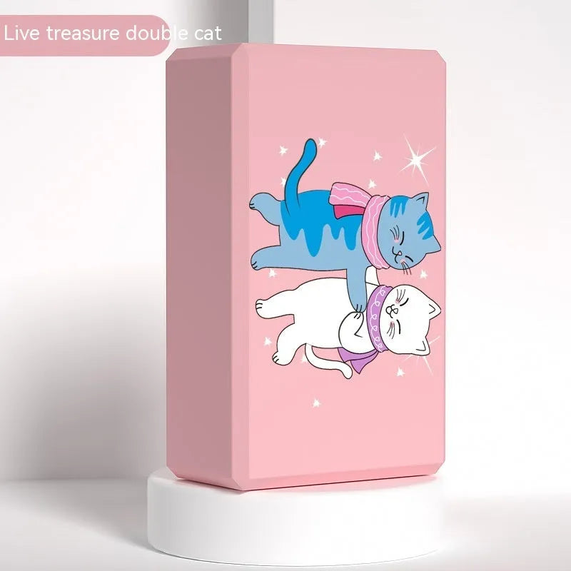 High-density EVA yoga block in pink next to a dark blue block, showing 7.5cm height and printed cartoon design options.
