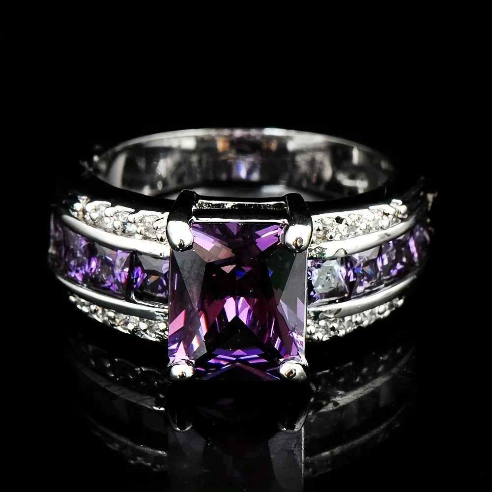 Personalised zinc alloy fashion ring with diamond and blue or purple zircon stone designs.