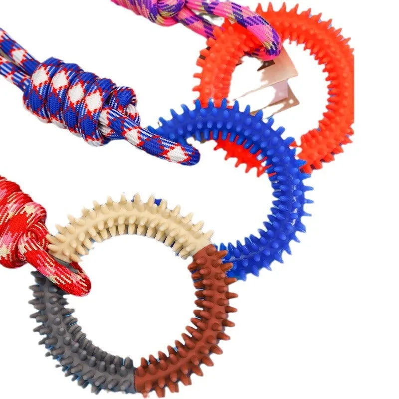 Blue, red, and rose red braided rope dog chew toy with knot design measuring 43cm long