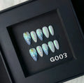 HAILANG blue plastic false nail tips set showing shell design with XS, S, M, L sizes.