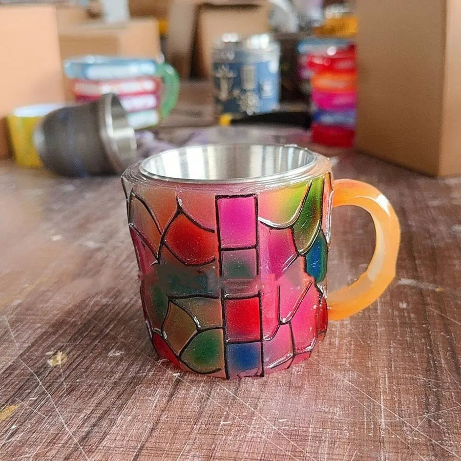 Painted synthetic resin decorative coffee cup in American style library or pattern design measuring 13x10x10cm