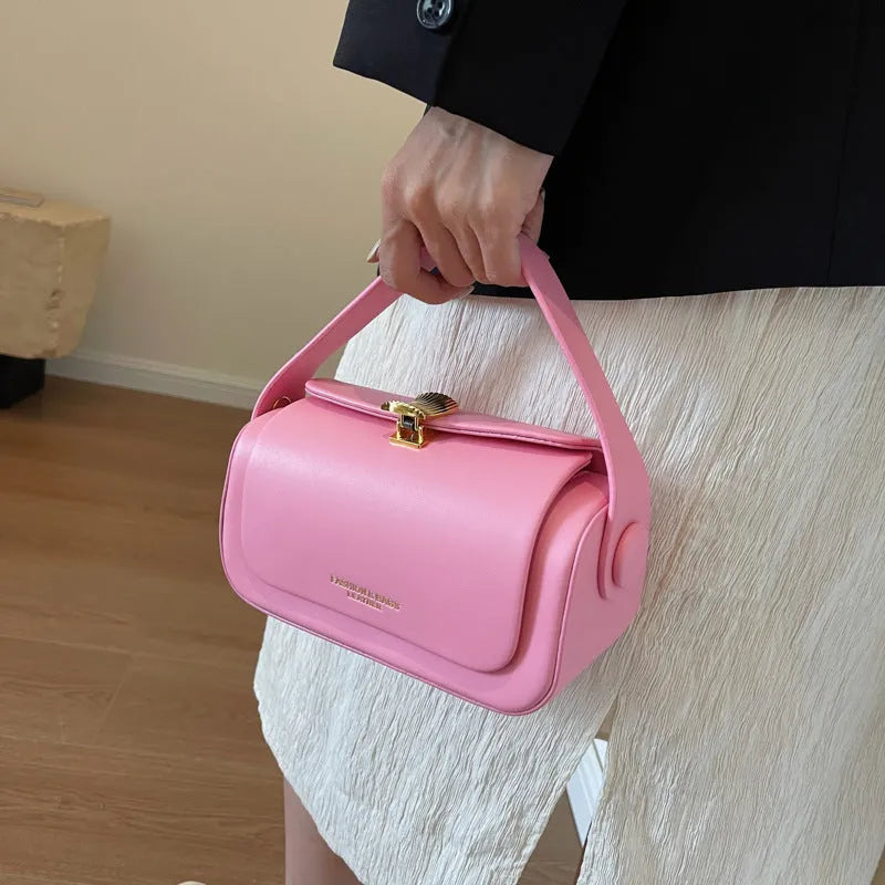 Personalised women's shoulder messenger bag in PU leather with letter detailing, shown in beige colour.