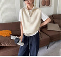 Retro half-zip sleeveless knit vest in mesh polyester fabric shown in a solid colour