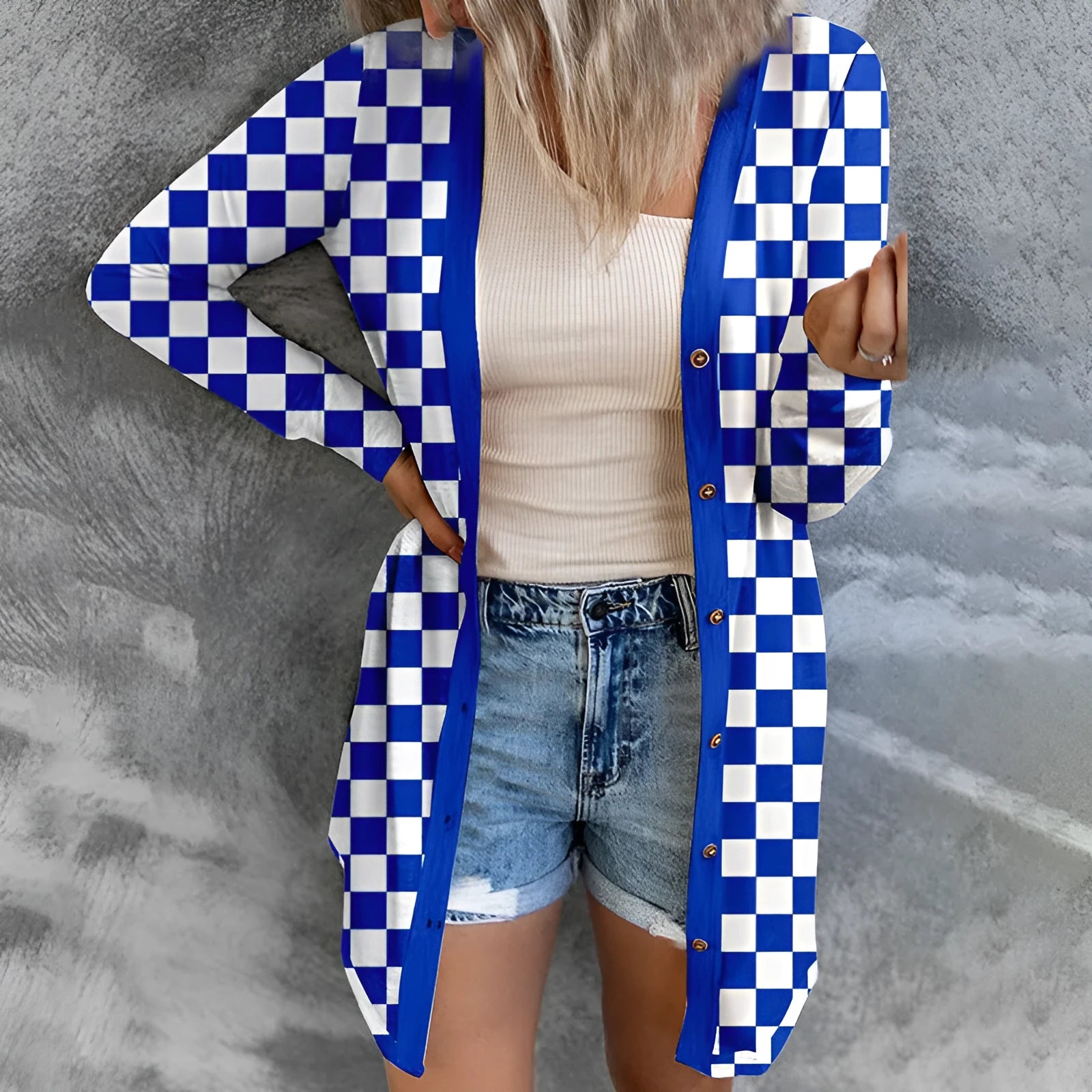 Women's long grey plaid pattern knitted cardigan coat with regular sleeves, shown on a model.