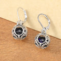 Vintage geometric blue gemstone pendant earrings with hollow engraving detail in silver-tone zinc alloy