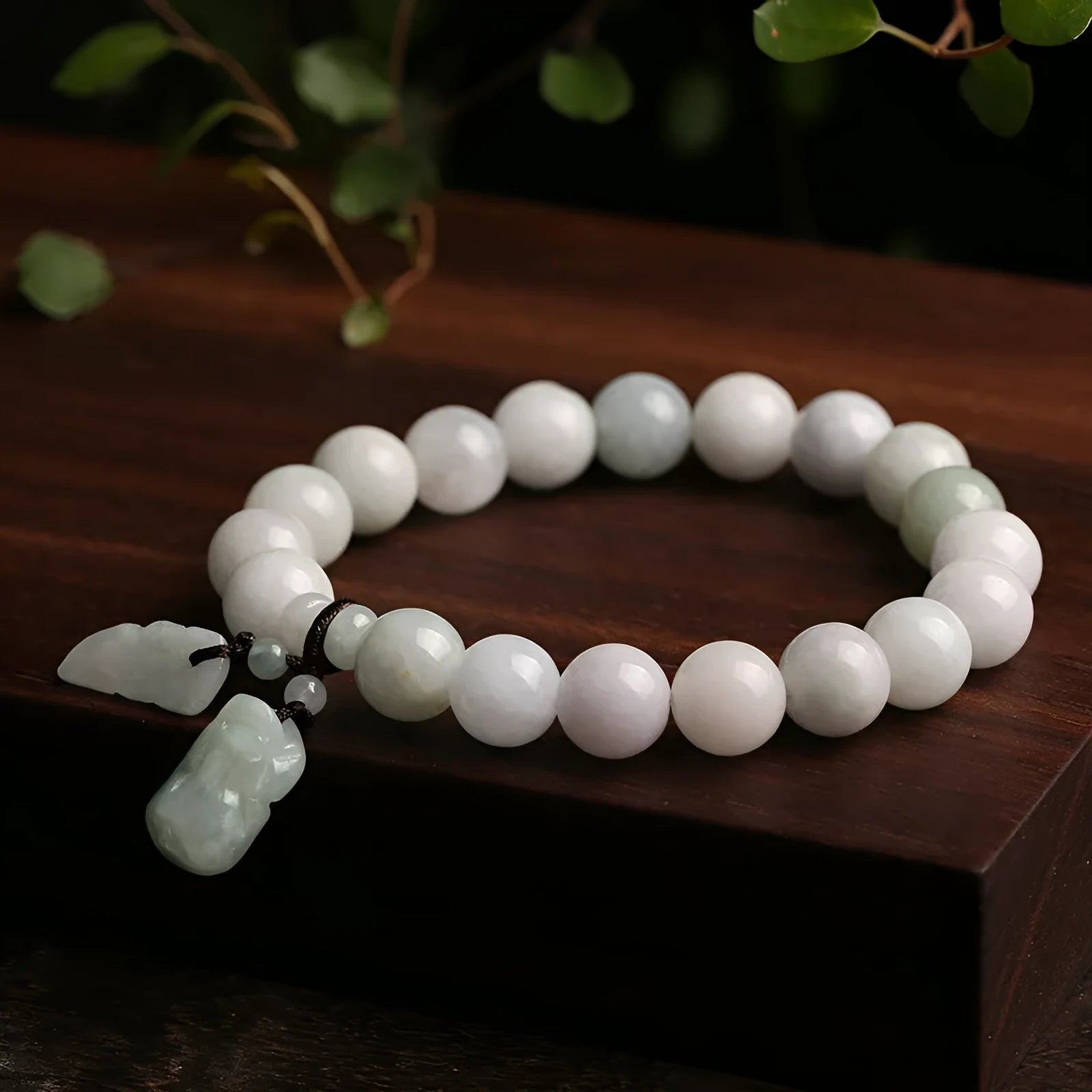 Adjustable natural jade bracelet with geometric pendant and symbolic apple, Maitreya, gourd, and money bag charms.