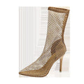 Gold mesh pointed toe stiletto high heel sandals on a white background