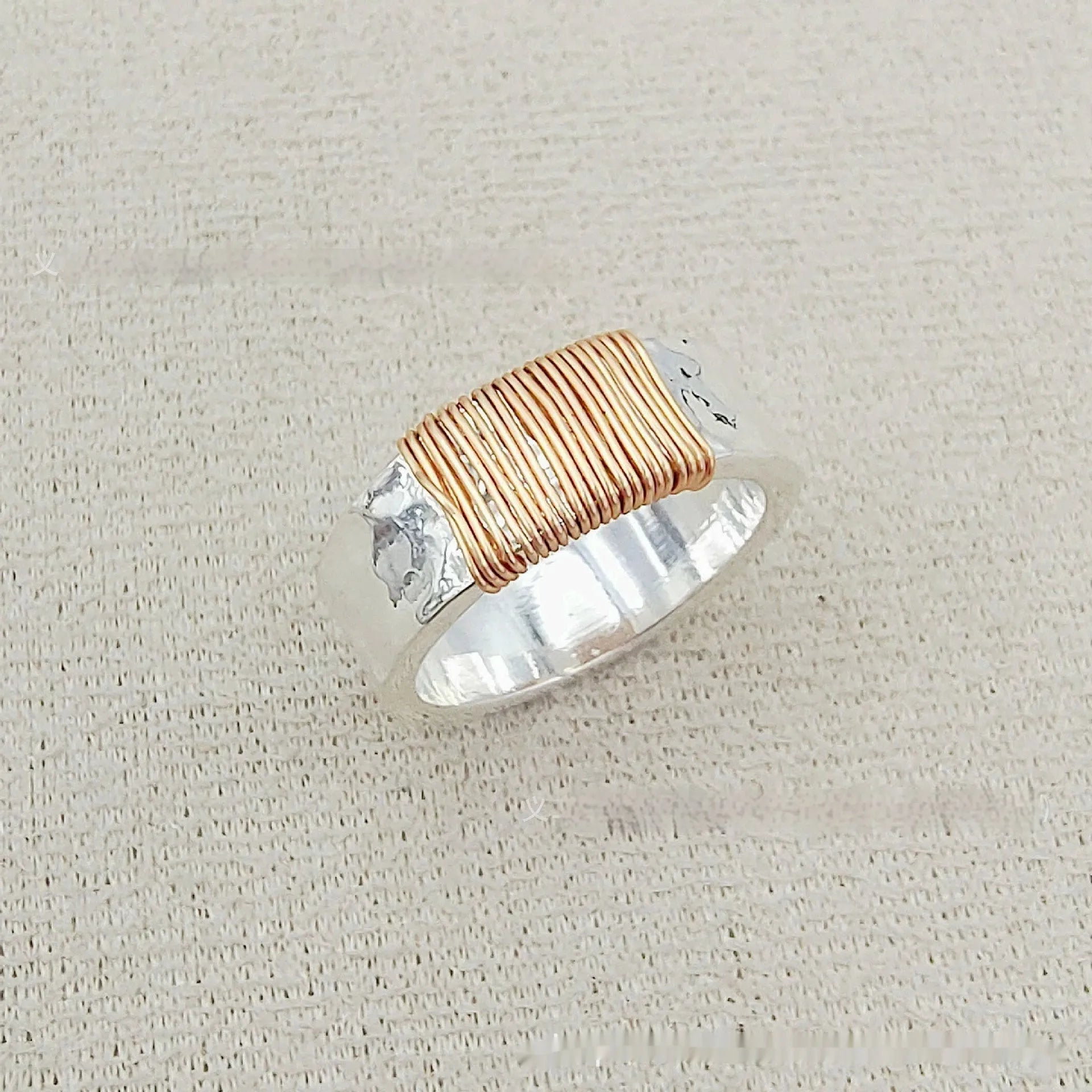 Geometric copper ring bracelet with irregular coil design in silver gold finish
