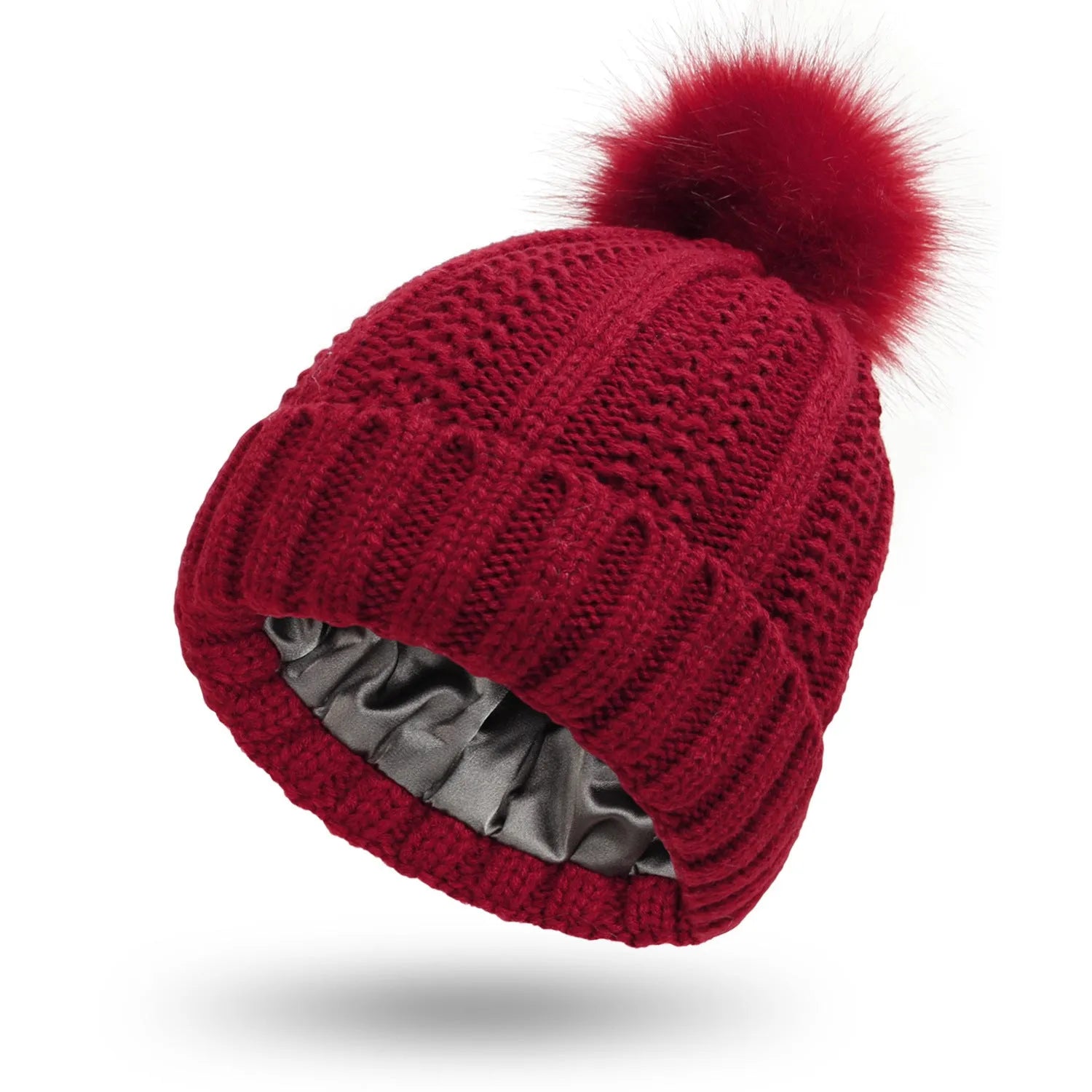 Women's wool beanie hat with satin lining and faux fur pom pom in multiple colours