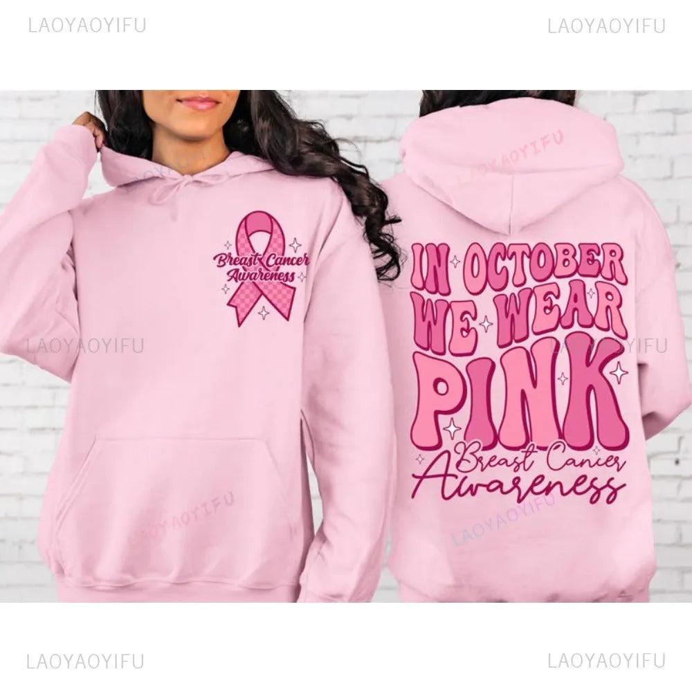 Breast cancer awareness hoodie with retro art pattern and side seam pockets in pink colour.