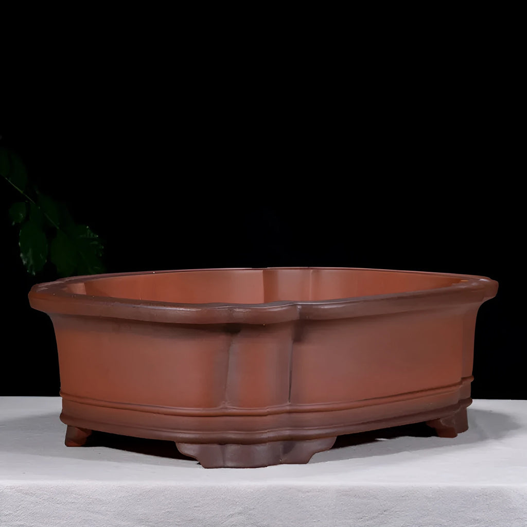 Antique jade Chinese style purple clay flowerpot with golden marble patterning, oval shape, 71cm long.