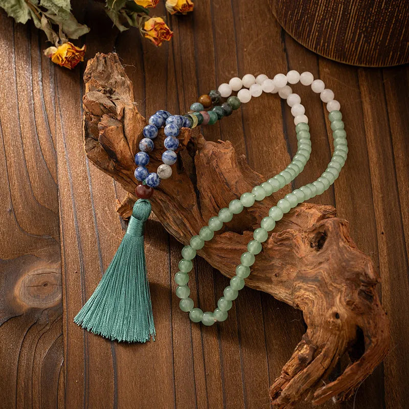 Vintage bohemian style beaded sweater chain with tassel detail and matching bracelet