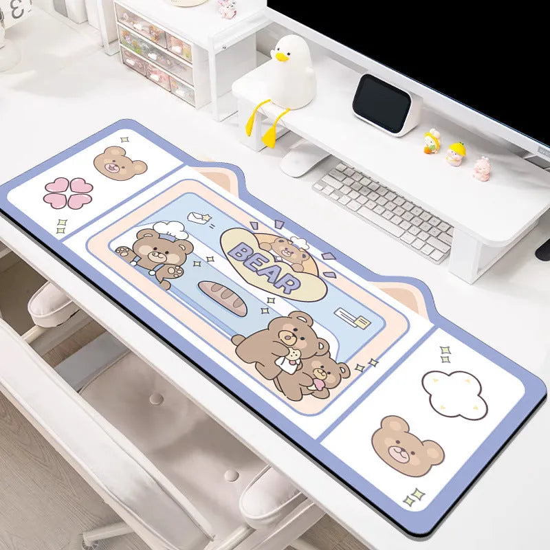 Oversized natural rubber mouse pad desk mat in pink bunny design on desk surface