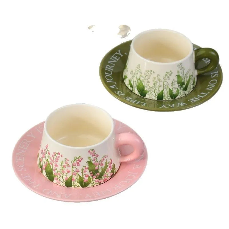 Ceramic coffee cup set with two 300ml cups, saucers and stirring spoons in decorative designs
