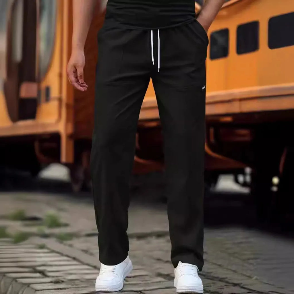 Men's polyester trousers for spring and autumn available in multiple colours and sizes