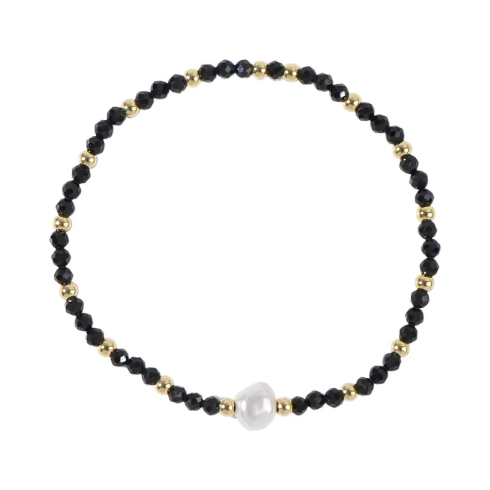 A geometric natural stone bracelet with an ellipse detail, shown in one of fifteen available colour options.