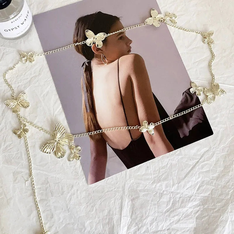 Women's gold butterfly waist chain alloy accessory with 104cm length on model