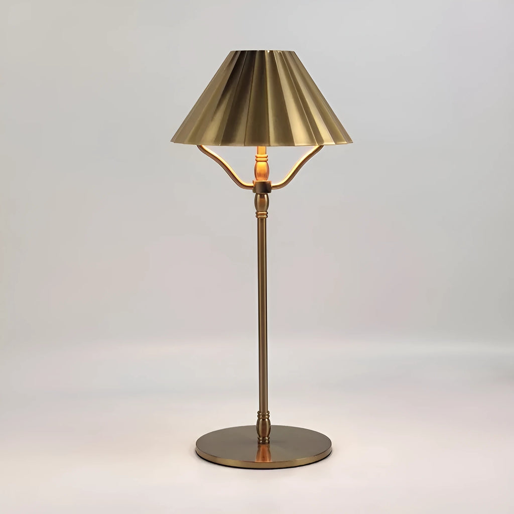 Gold-coloured alloy desk lamp with a fabric lampshade, showing a USB Type-C charging port.