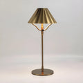 Gold-coloured alloy desk lamp with a fabric lampshade, showing a USB Type-C charging port.