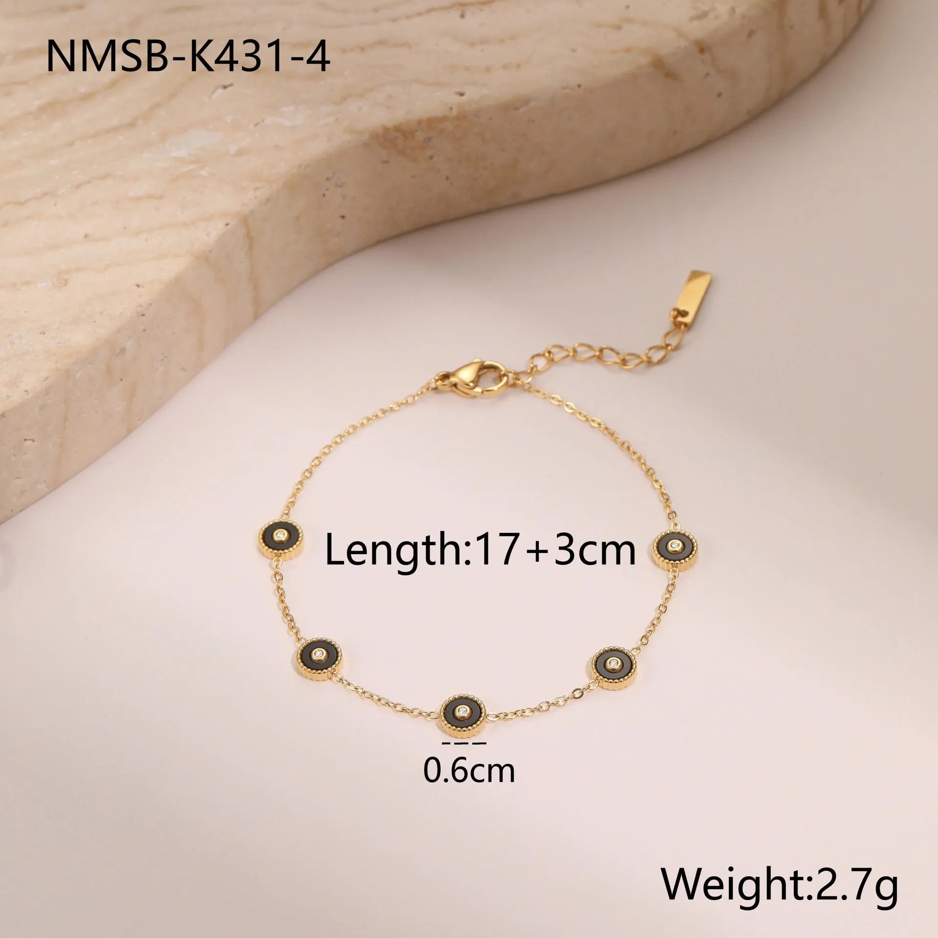 Geometric fritillary pattern stainless steel bracelet with 18K gold plating and matching necklace