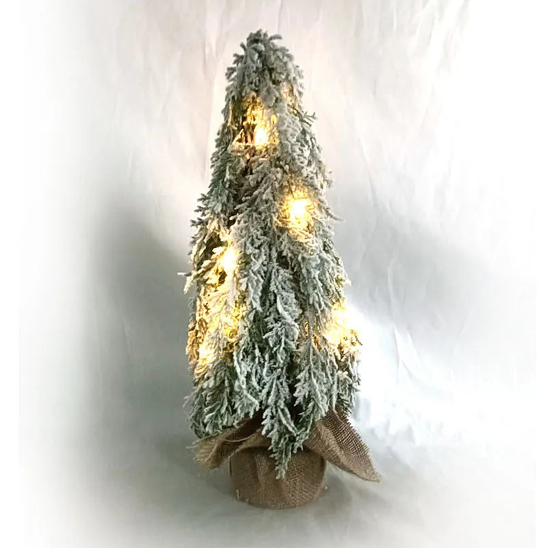 24-inch artificial Christmas tree with white snow finish and built-in LED lights on branches