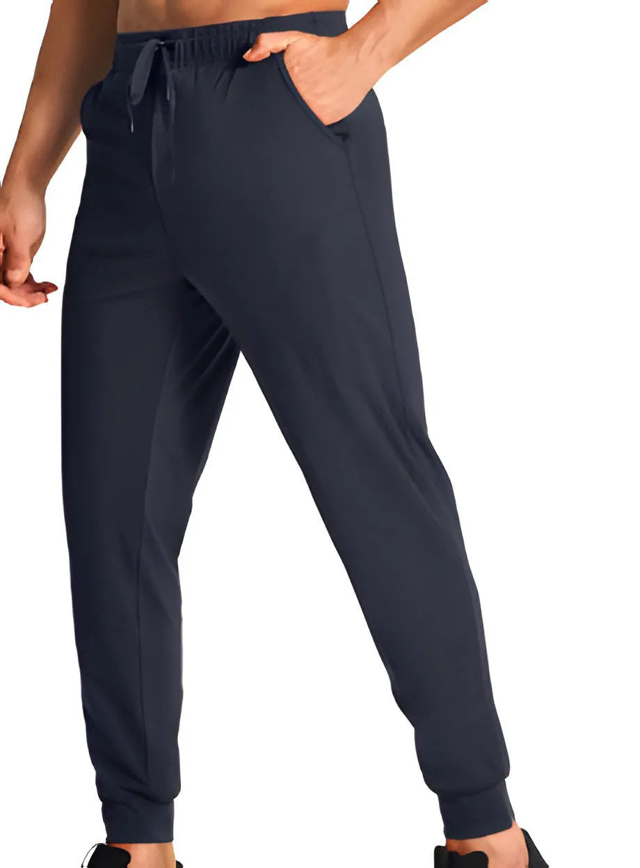 Men's loose-fit straight-leg casual trousers in a solid colour, made from polyester fabric.